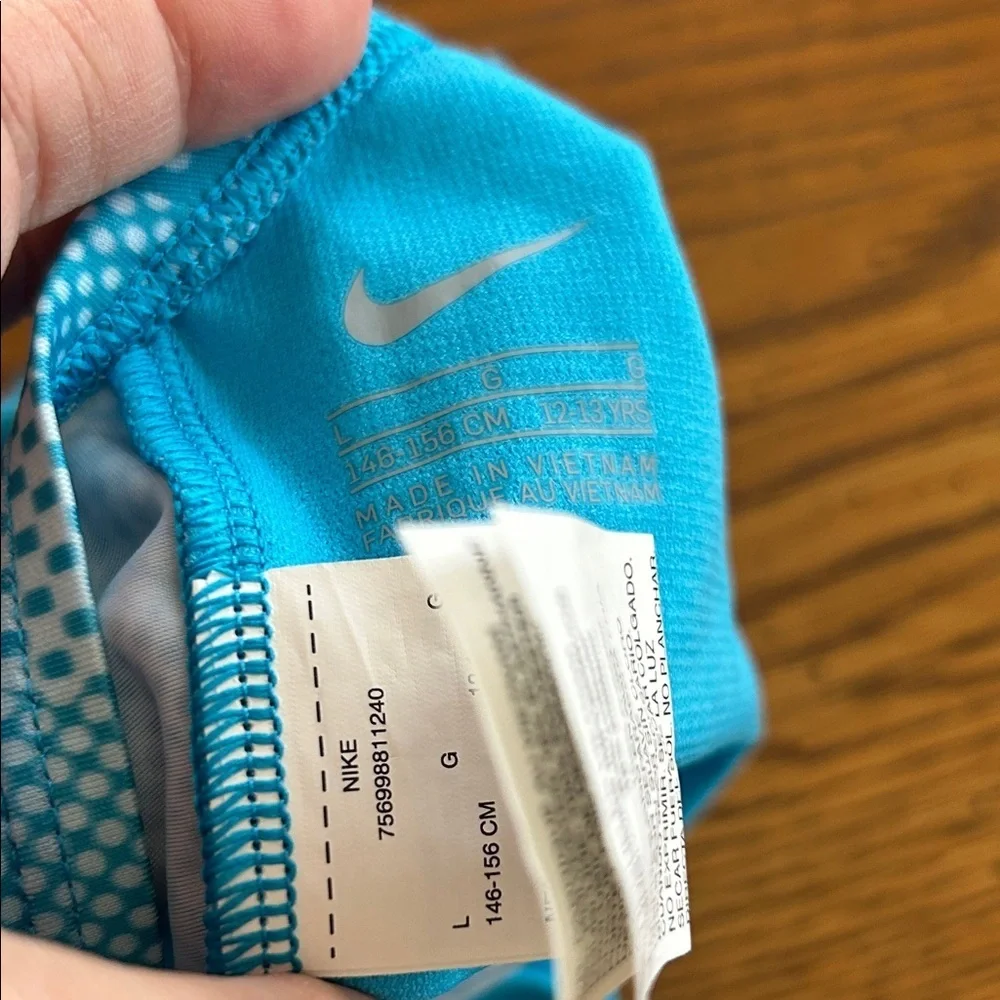 Nike vibrant turquoise